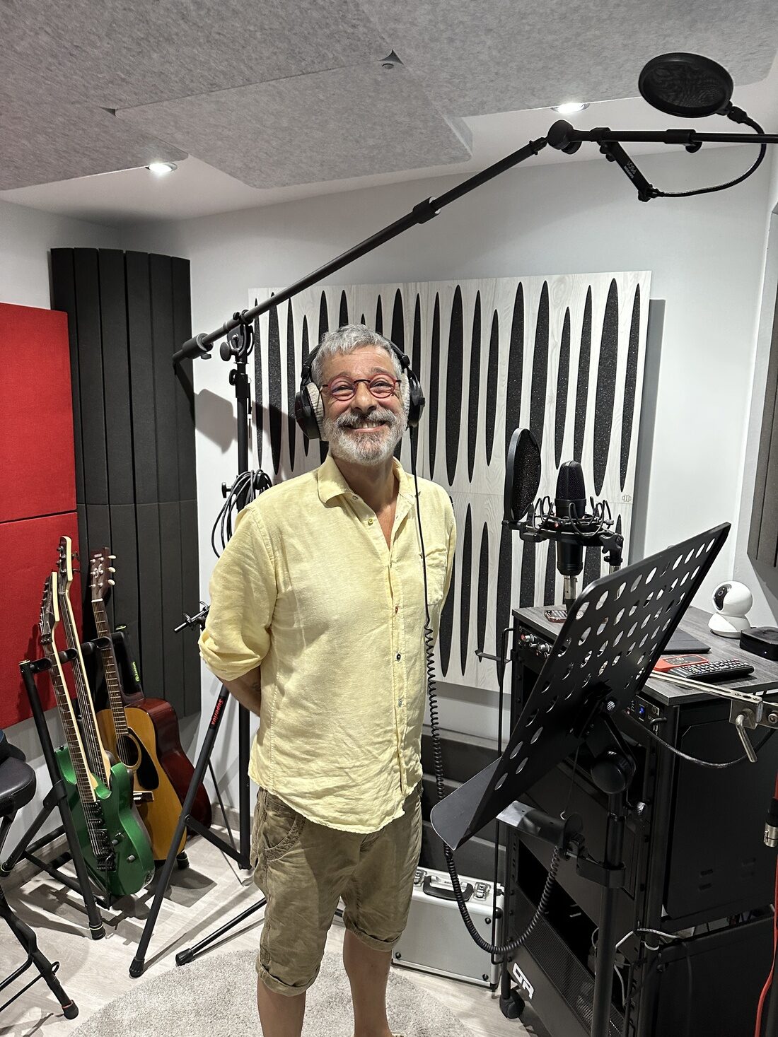 Recording artist in the vocal booth at Graba Music Studio